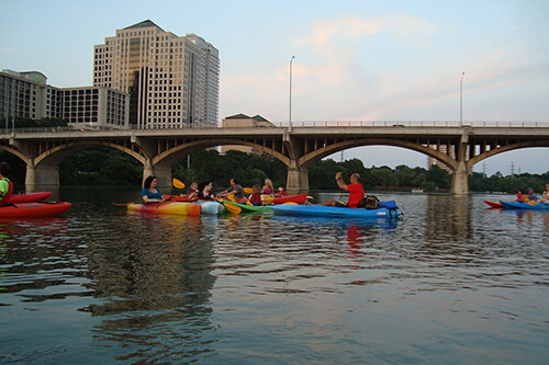 Kayaks and congress bridge